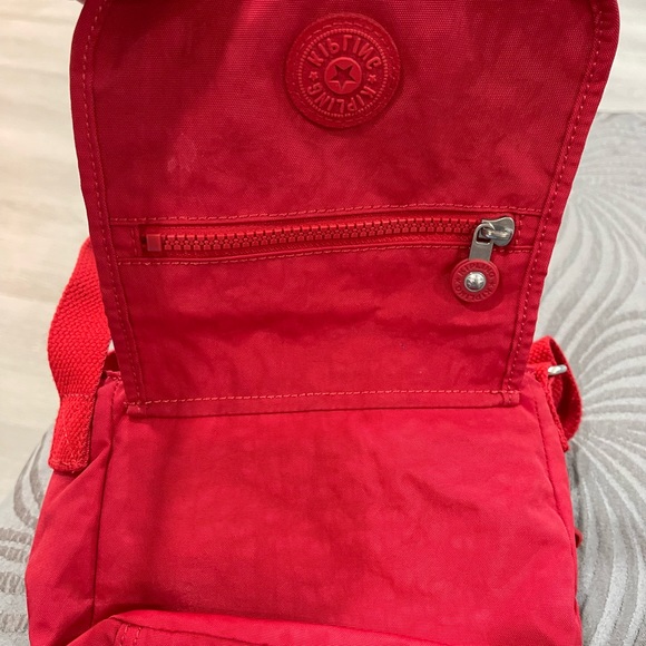Kipling Bags Kipling New No Tags In Red Also A Belt Purse Poshmark